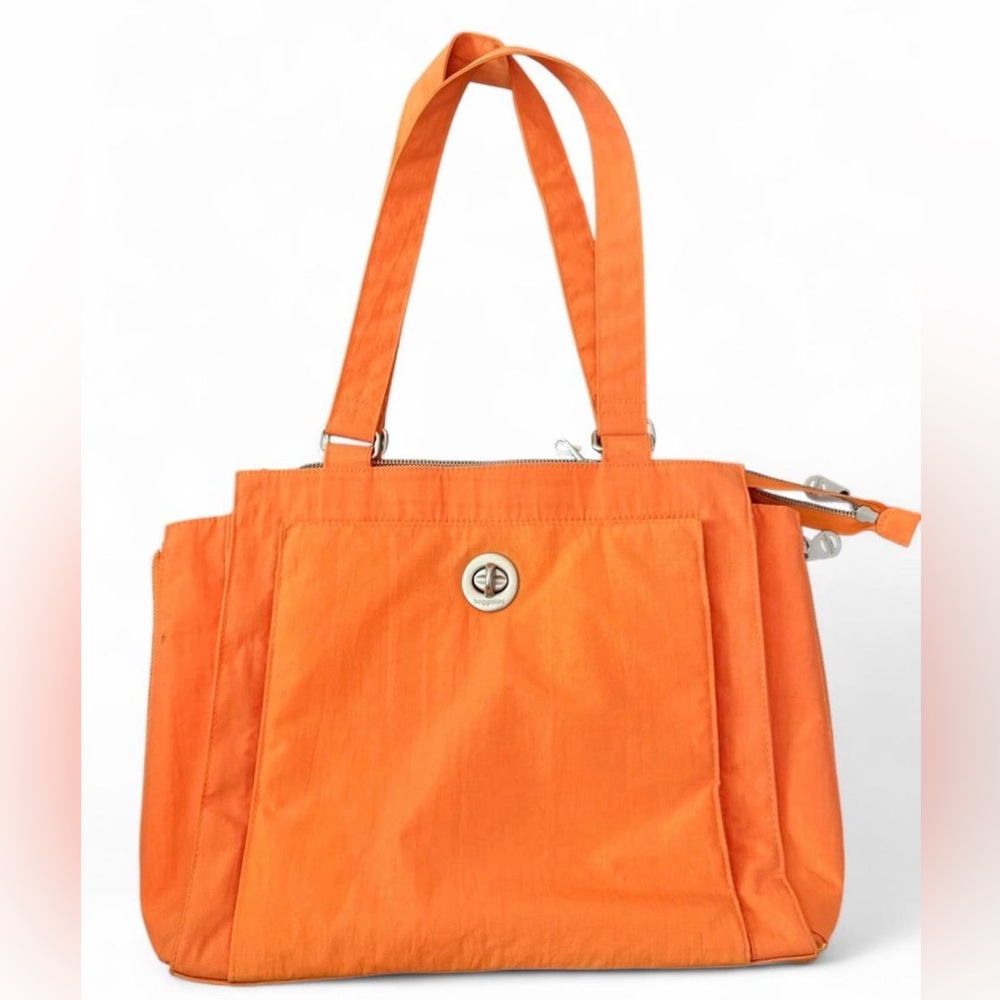 BAGGALLINI orange tote & travel bag. Expandable sides, luggage pass through